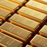 Золото растет на фоне повышения базовой ставки