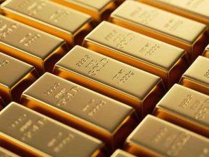 Золото растет на фоне повышения базовой ставки